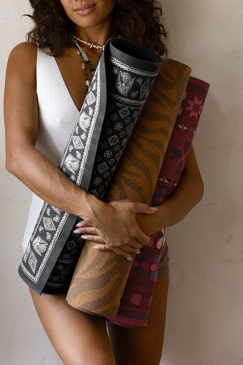 A collection of SunHawk yoga mats. Australian  artist designs