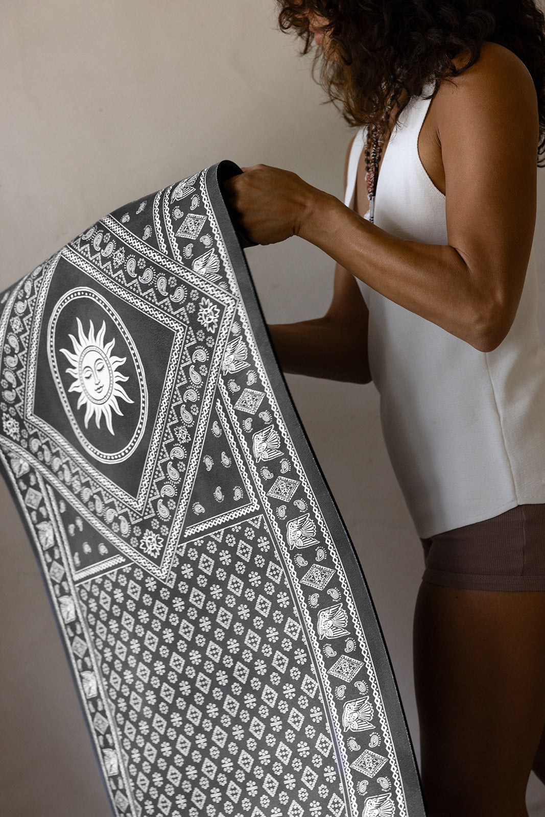 Premium SunHawk Yoga mat with australian artwork of a sun motif.