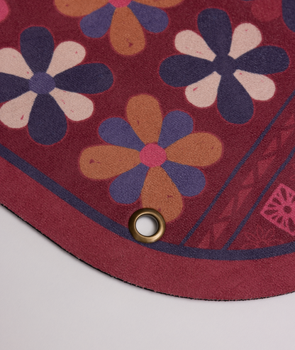 detail of the brass metal eyelet on the SunHawk yoga and pilates mat